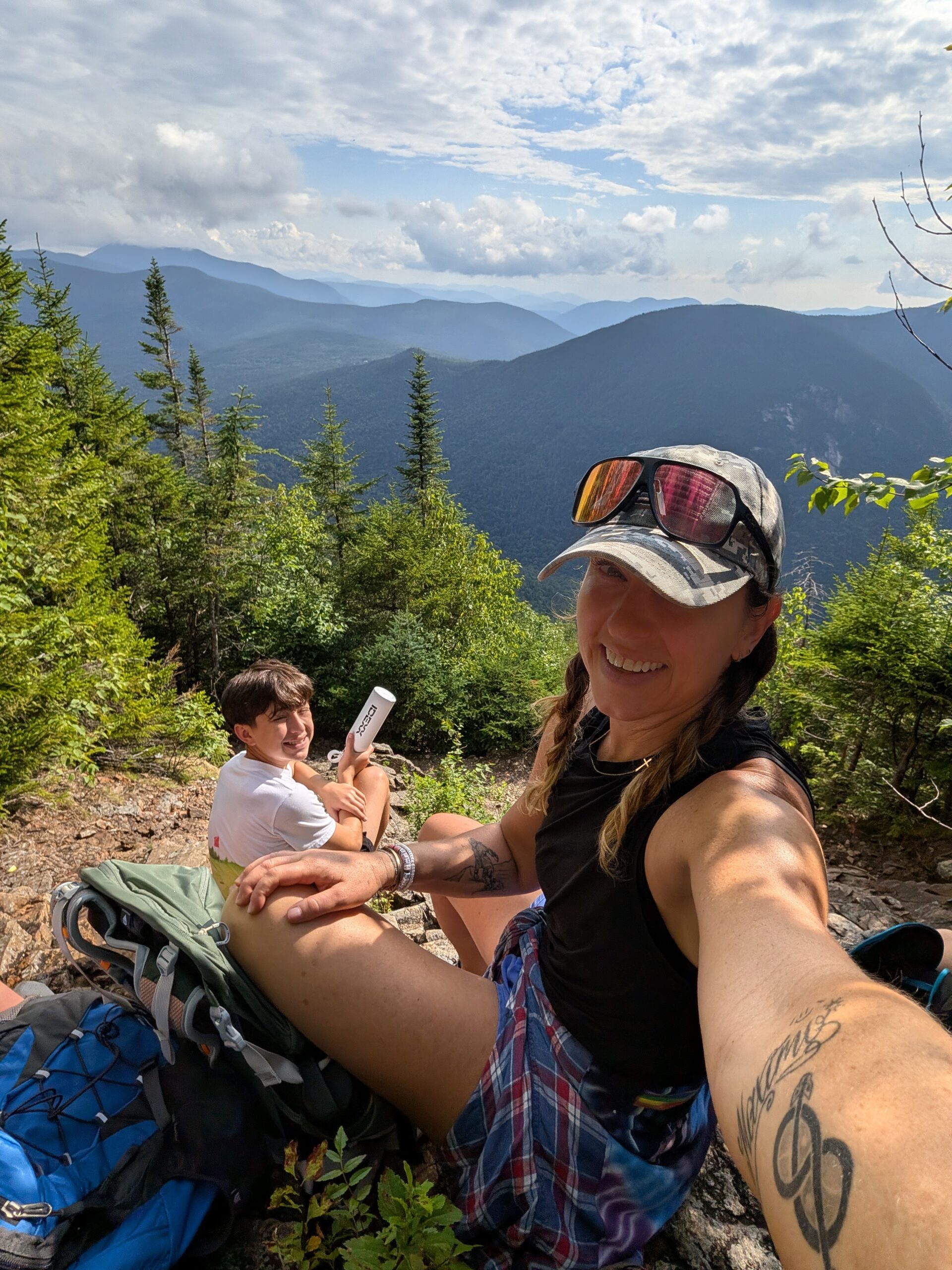 Stephanie and Max hiking Mount Osceola in the White Mountains of New Hampshire